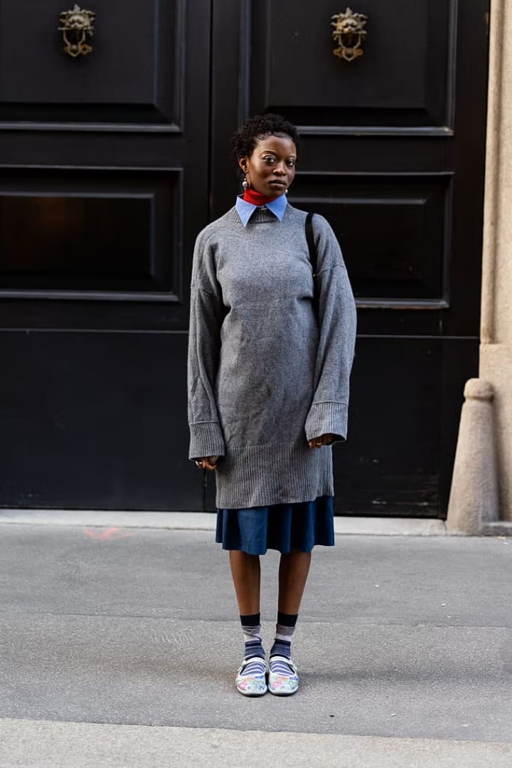 girl in a gray coat