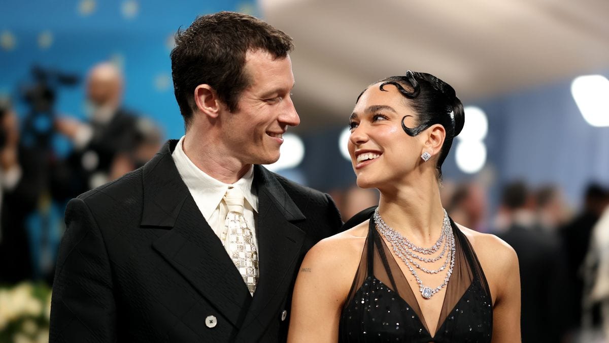 callum turner and dua lipa on red carpet