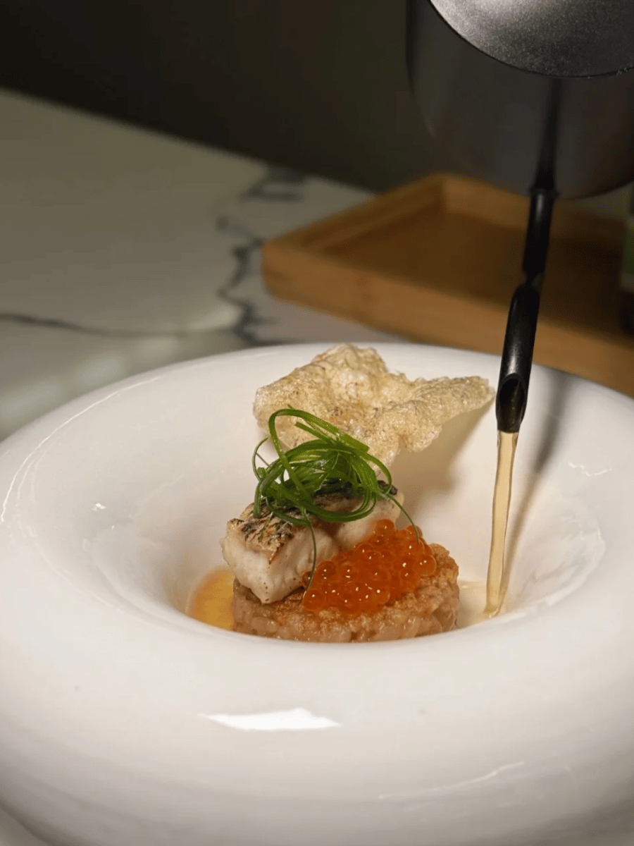 tandem restaurant's Steeped: yaki onigiri, mackerel, genmai dashi, and ikur