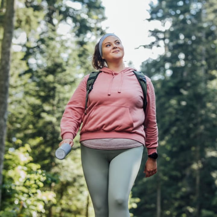 girl walking in forest