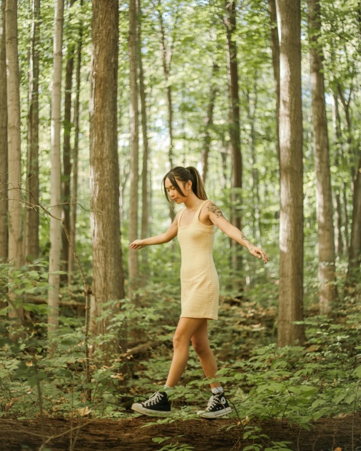 girl walking in the woods