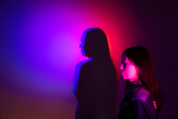 girl in purple and pink lighting