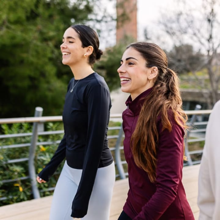 two girls walking outside